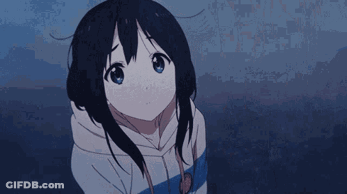A Girl With Black Hair And Blue Eyes Is Wearing A Striped Hoodie . GIF