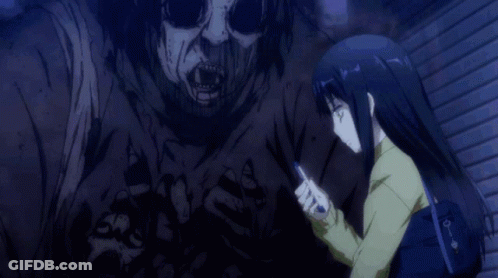 A Girl With Black Hair And Green Eyes Is Looking At Her Phone GIF