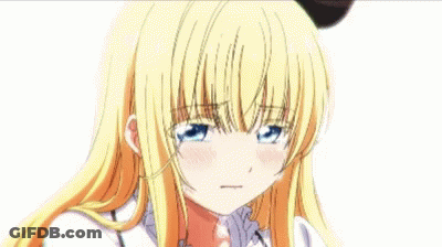 A Girl With Blonde Hair And Blue Eyes Is Crying With Her Eyes Closed GIF