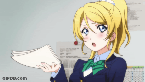 A Girl With Blonde Hair And Blue Eyes Is Holding A Piece Of Paper In Her Hand GIF