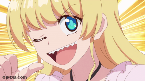 A Girl With Blonde Hair And Blue Eyes Is Making A Face GIF