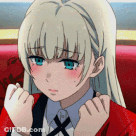 A Girl With Blonde Hair And Blue Eyes Is Sitting On A Red Couch . GIF