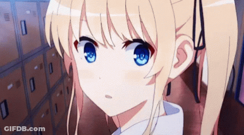 A Girl With Blonde Hair And Blue Eyes Is Standing In A Hallway Next To Lockers . GIF