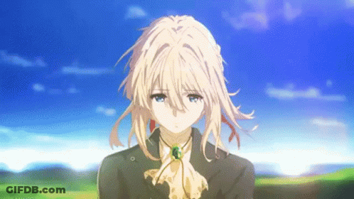 A Girl With Blonde Hair And Blue Eyes Is Wearing A Suit And Tie And Standing In A Field . GIF