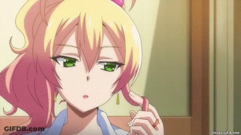 A Girl With Blonde Hair And Green Eyes Has A Pink Flower In Her Hair GIF