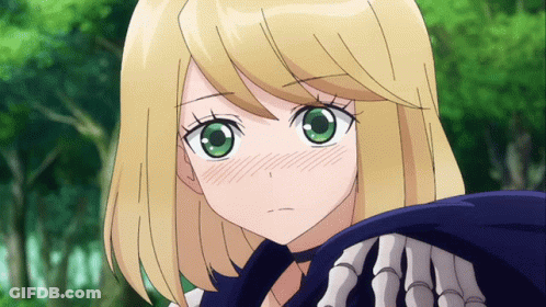 A Girl With Blonde Hair And Green Eyes Is Holding A Skeleton Arm GIF
