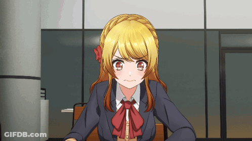 A Girl With Blonde Hair And Red Eyes Is Sitting At A Table GIF