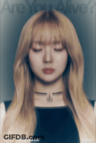 A Girl With Blonde Hair Is On The Cover Of A Book Titled Are You Alive GIF