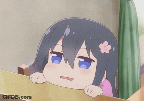 A Girl With Blue Eyes And A Flower In Her Hair GIF