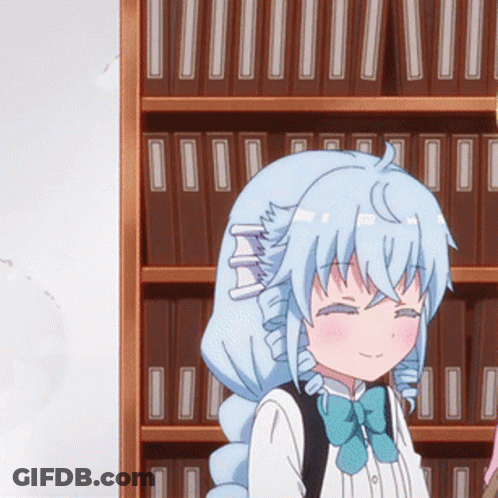A Girl With Blue Hair And A Blue Bow Tie Stands In Front Of A Bookshelf GIF