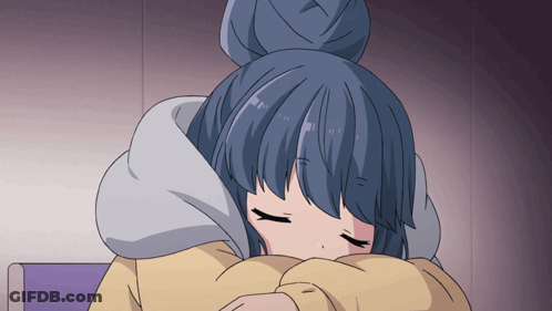 A Girl With Blue Hair And A Bun Is Sleeping With Her Eyes Closed GIF