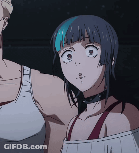 A Girl With Blue Hair And A Choker Looks At The Camera GIF