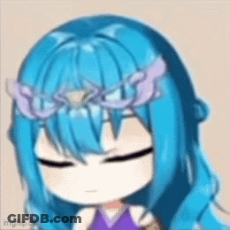 A Girl With Blue Hair And A Flower Crown On Her Head GIF