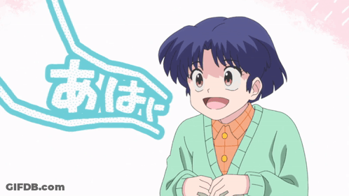 A Girl With Blue Hair And A Green Sweater Stands In Front Of A Speech Bubble With Chinese Writing On It GIF