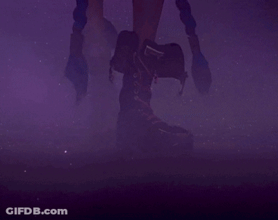 A Girl With Blue Hair And A Tattoo On Her Arm Is Standing In Front Of A Purple Sky . GIF