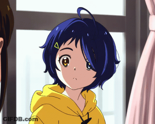 A Girl With Blue Hair And A Yellow Hoodie Has A Yellow Triangle On Her Head GIF