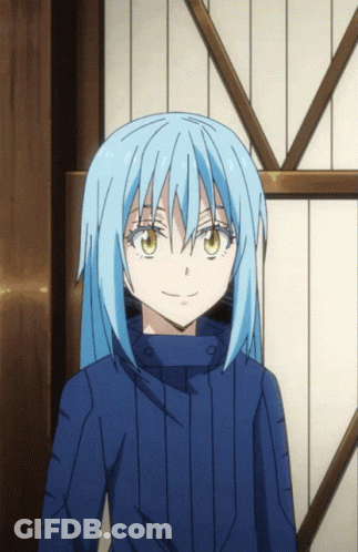 A Girl With Blue Hair And Brown Eyes Is Smiling GIF