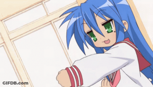 A Girl With Blue Hair And Green Eyes Is Standing In A Room GIF