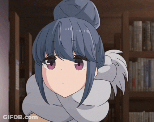 A Girl With Blue Hair And Purple Eyes Is Standing In Front Of A Bookshelf GIF