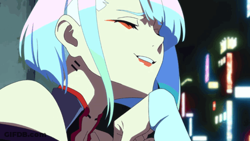 A Girl With Blue Hair And Red Lips Is Smiling GIF