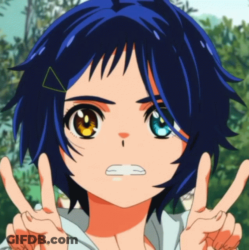 A Girl With Blue Hair And Yellow Eyes Is Giving A Peace Sign GIF