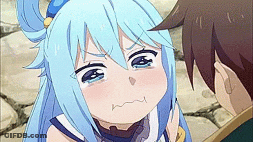 A Girl With Blue Hair Is Crying And Making A Funny Face While Standing Next To A Man . GIF