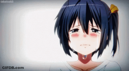 A Girl With Blue Hair Is Crying With Tears Running Down Her Face . GIF