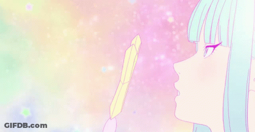 A Girl With Blue Hair Is Holding A Feather In Her Hand And Looking At It . GIF