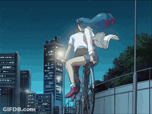 A Girl With Blue Hair Is Riding A Bike With A Man Behind Her GIF