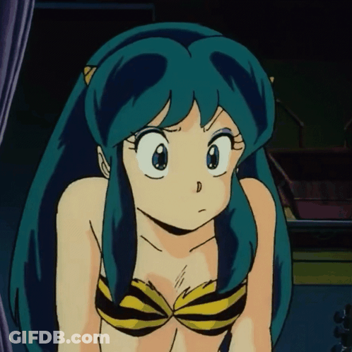 A Girl With Blue Hair Is Wearing A Yellow And Black Bikini Top GIF