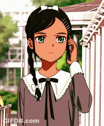 A Girl With Braids Is Talking On A Cellphone GIF