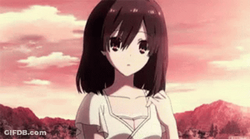 A Girl With Brown Hair And A White Shirt Is Standing In Front Of A Mountain . GIF