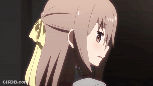 A Girl With Brown Hair And A Yellow Bow On Her Head GIF