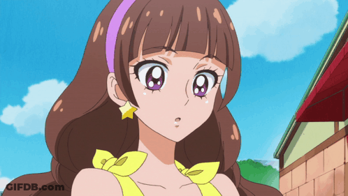 A Girl With Brown Hair And Purple Eyes Is Wearing A Yellow Dress GIF