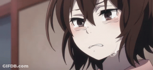 A Girl With Brown Hair Is Crying With Tears Running Down Her Face GIF