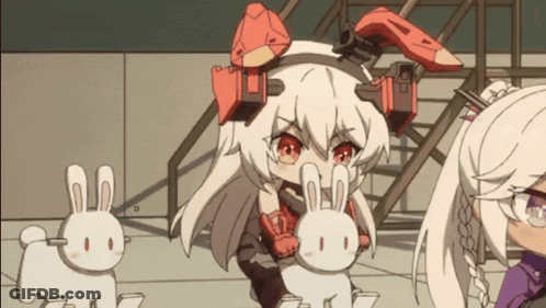 A Girl With Bunny Ears Is Standing Next To A Girl With Bunny Ears GIF