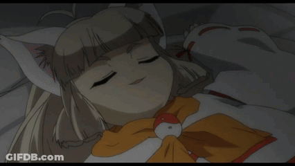 A Girl With Cat Ears And A Bow Tie Is Smiling GIF