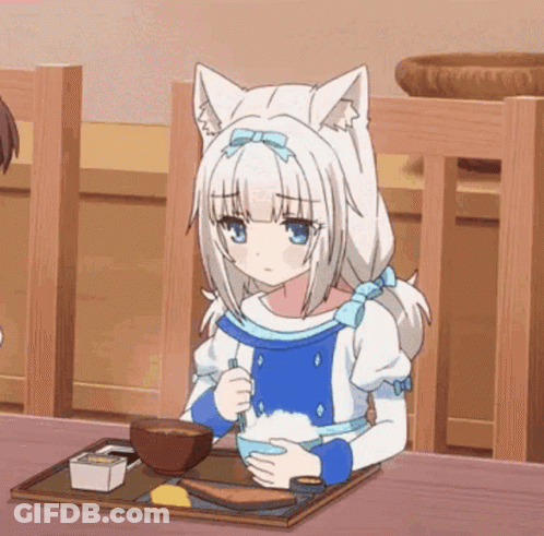 A Girl With Cat Ears Is Sitting At A Table Eating Rice . GIF