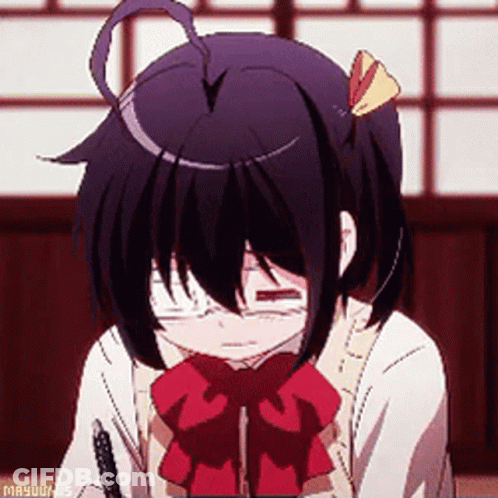 A Girl With Glasses And A Red Bow Tie Is Sitting Down With Her Eyes Closed . GIF