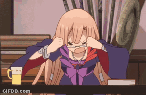 A Girl With Glasses Is Sitting At A Table With A Mug Of Beer GIF