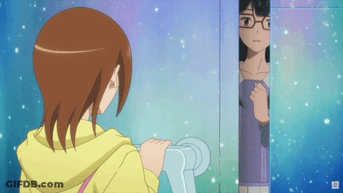 A Girl With Glasses Is Standing In A Doorway GIF