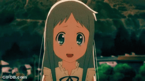 A Girl With Gray Hair And Blue Eyes Is Smiling And Looking At The Camera GIF