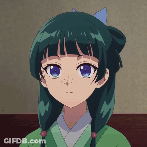 Girl With Green Hair And Blue Eyes In Green Shirt GIF