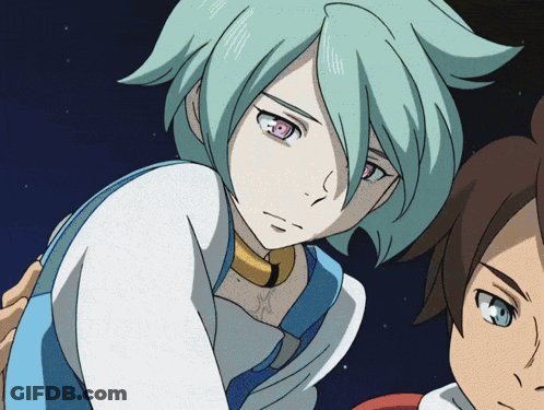A Girl With Green Hair And Red Eyes Is Standing Next To A Boy With Brown Hair GIF