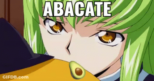A Girl With Green Hair Is Holding An Avocado In Her Hand . GIF