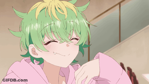 A Girl With Green Hair Is Wearing A Pink Shirt And Laughing GIF