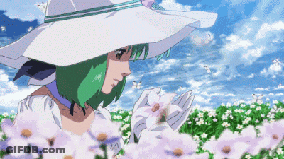 A Girl With Green Hair Wearing A White Hat And Gloves Smelling A Flower GIF