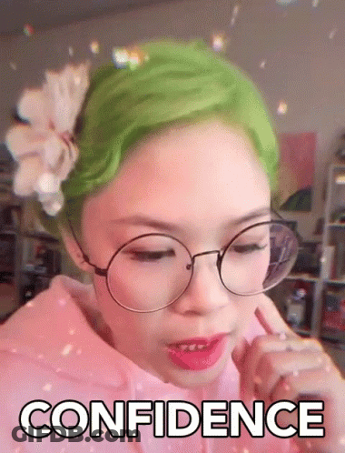 Girl With Green Hair Glasses And Flower Says Confidence GIF