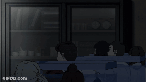 A Girl With Her Hands On Her Ears Is Screaming In A Dark Room GIF