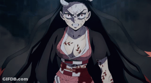 A Girl With Horns And A Tattoo On Her Chest Looks Very Angry GIF